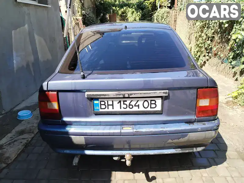 W0L000089K5233377 Opel Vectra 1989 Лифтбек 1.6 л. Фото 7