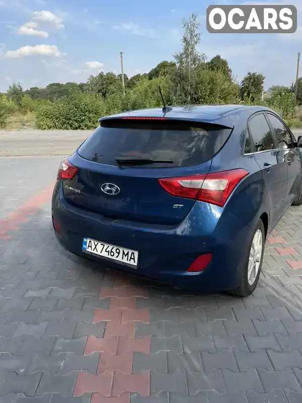 KMHD35LH0EU196010 Hyundai Elantra 2014 Хэтчбек  Фото 4