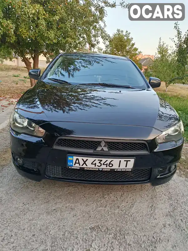 Хетчбек Mitsubishi Lancer 2010 1.8 л. Ручна / Механіка обл. Харківська, Харків - Фото 1/8