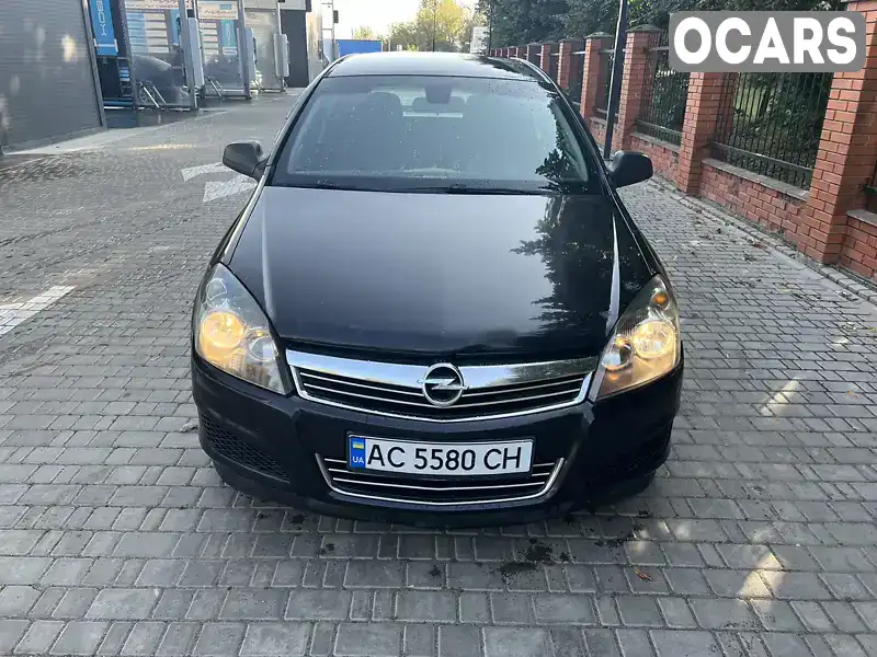 W0L0AHL35A2052316 Opel Astra 2010 Універсал 1.9 л. Фото 1