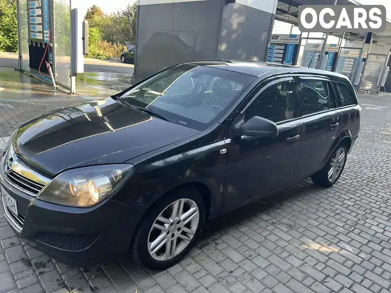 W0L0AHL35A2052316 Opel Astra 2010 Універсал 1.9 л. Фото 7