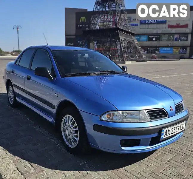 Седан Mitsubishi Carisma 2002 1.8 л. Ручная / Механика обл. Харьковская, Харьков - Фото 1/20