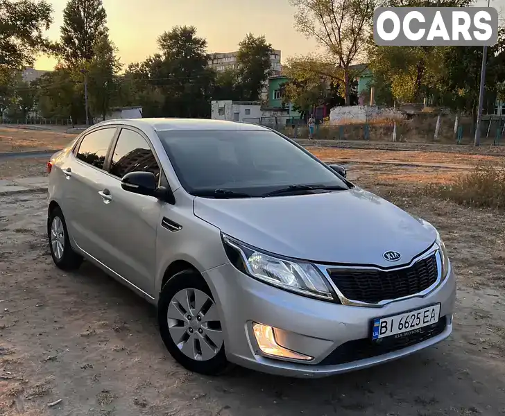 Седан Kia Rio 2012 1.59 л. обл. Харківська, Харків - Фото 1/21