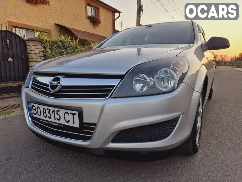 W0L0AHL35A2082682 Opel Astra 2010 Универсал 1.69 л. Фото 1