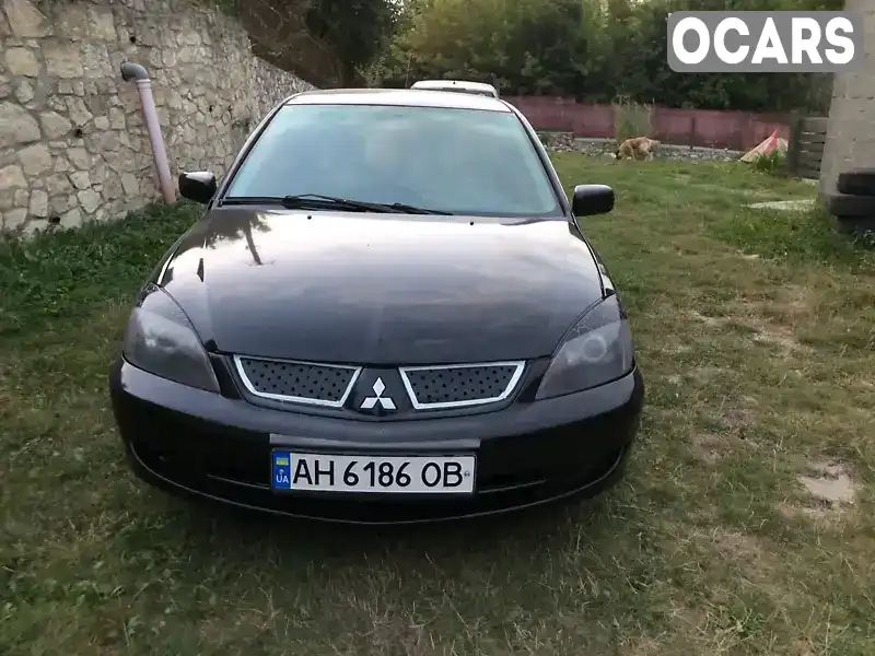 Седан Mitsubishi Lancer 2004 2 л. Ручна / Механіка обл. Тернопільська, Тернопіль - Фото 1/13