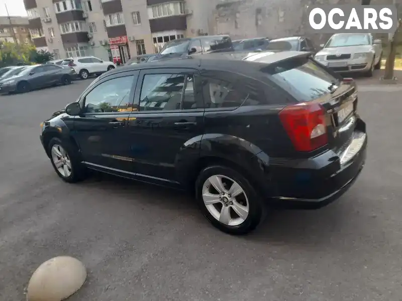 1C3CDWDA1CD507823 Dodge Caliber 2011 Внедорожник / Кроссовер 2 л. Фото 5