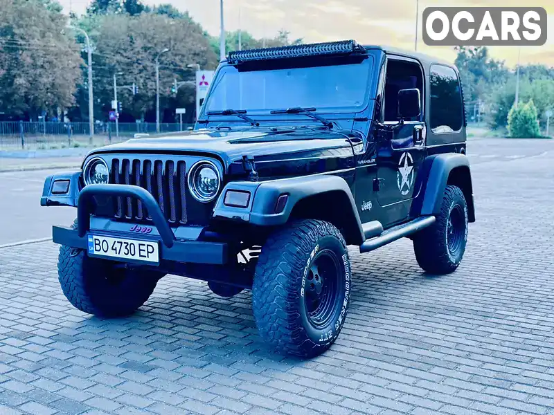 Позашляховик / Кросовер Jeep Wrangler 2001 2.87 л. Ручна / Механіка обл. Рівненська, Рівне - Фото 1/9