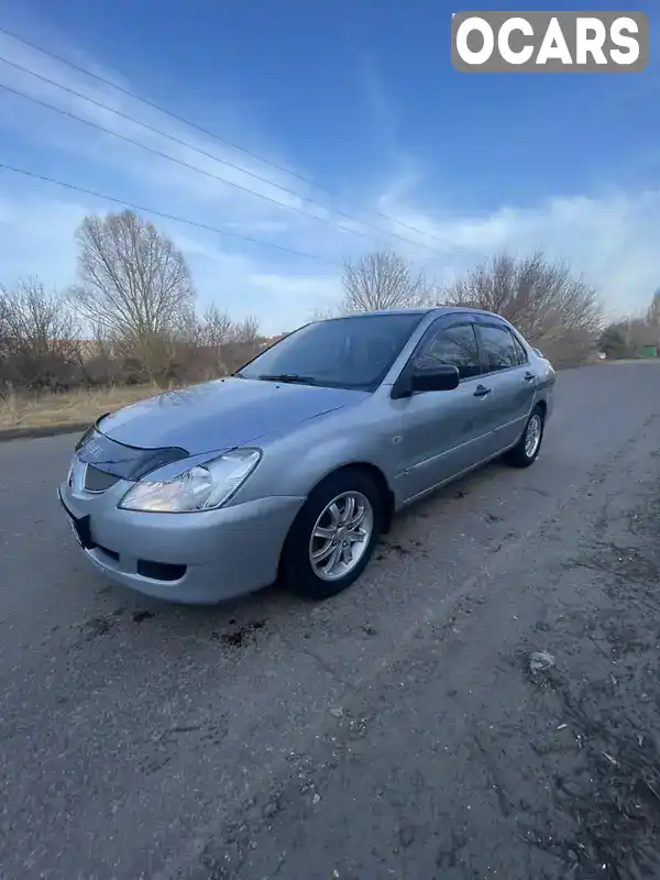 Седан Mitsubishi Lancer 2005 1.58 л. Ручна / Механіка обл. Чернігівська, Прилуки - Фото 1/17