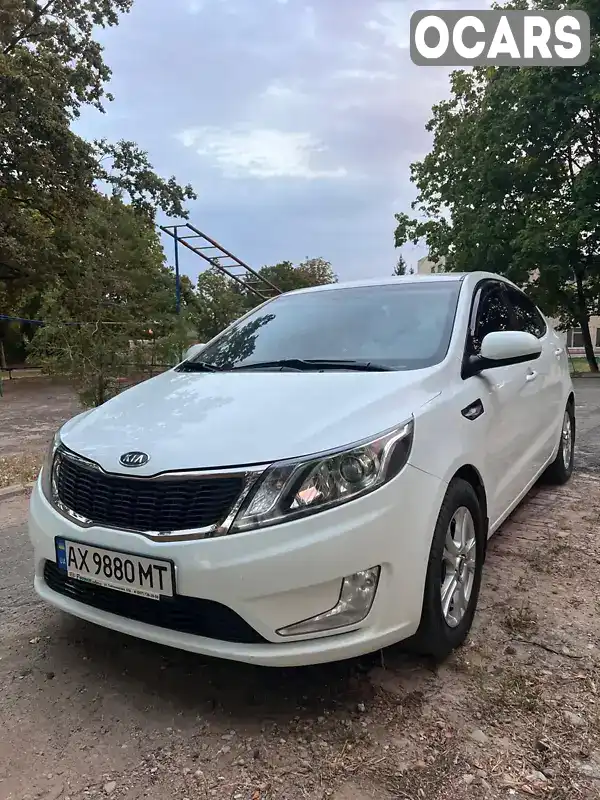 Седан Kia Rio 2012 1.59 л. Автомат обл. Харківська, Чугуїв - Фото 1/13