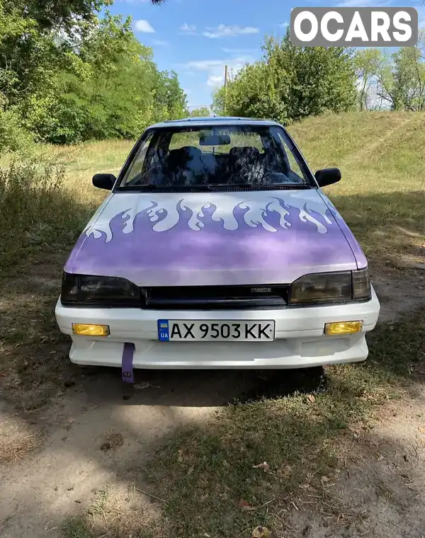 Хетчбек Mazda 323 1989 1.32 л. Ручна / Механіка обл. Харківська, Харків - Фото 1/4