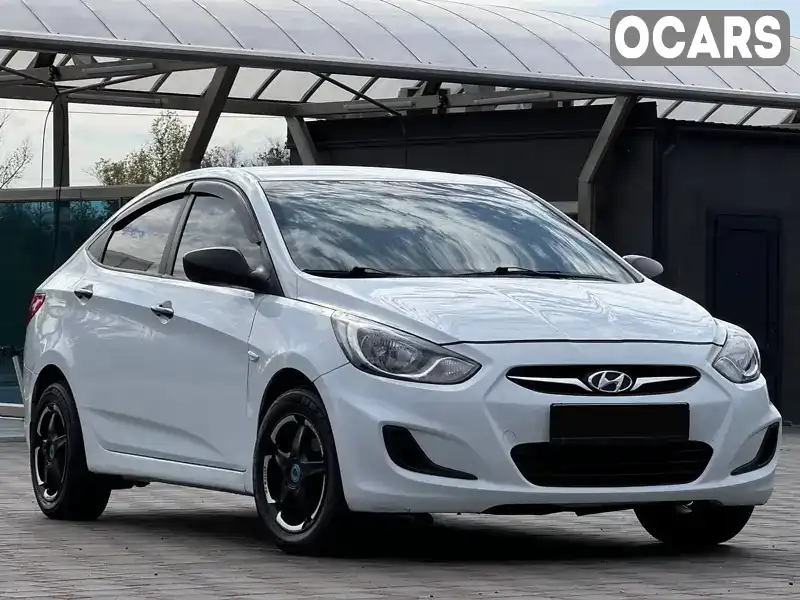 Седан Hyundai Accent 2013 1.4 л. Ручна / Механіка обл. Запорізька, Запоріжжя - Фото 1/16