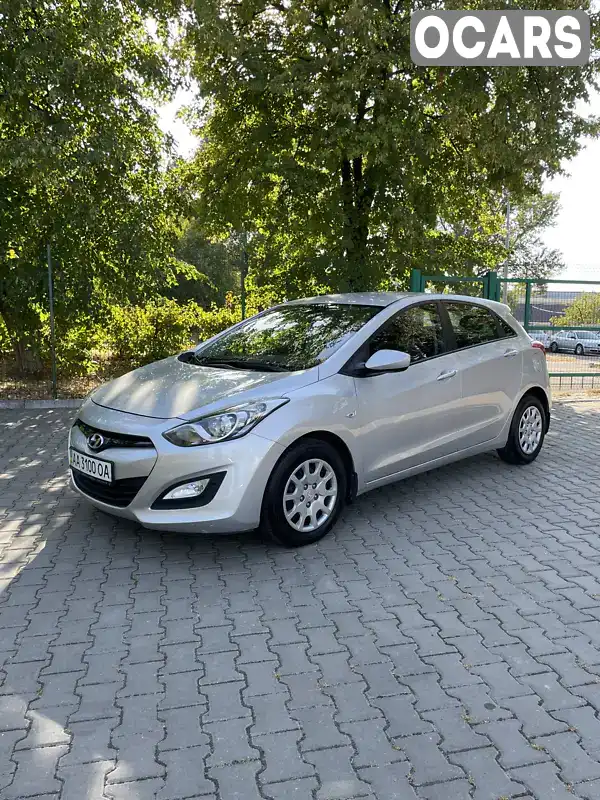 Хетчбек Hyundai i30 2013 1.4 л. Ручна / Механіка обл. Київська, Вишневе - Фото 1/21