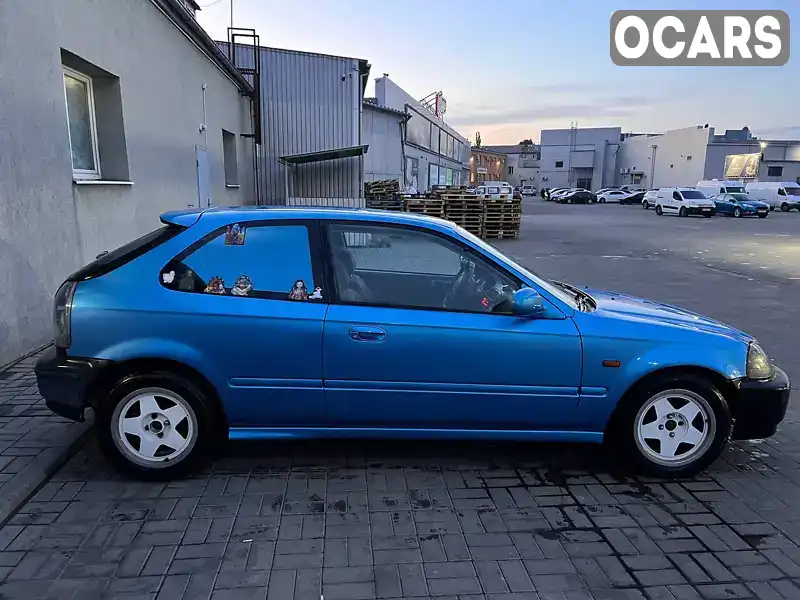 JHMEJ9330WS052776 Honda Civic 1998 Хетчбек 1.4 л. Фото 4