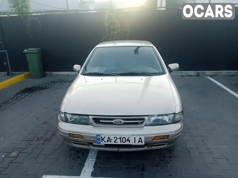 Седан Kia Sephia 1993 1.6 л. Ручна / Механіка обл. Київська, Вишневе - Фото 1/12