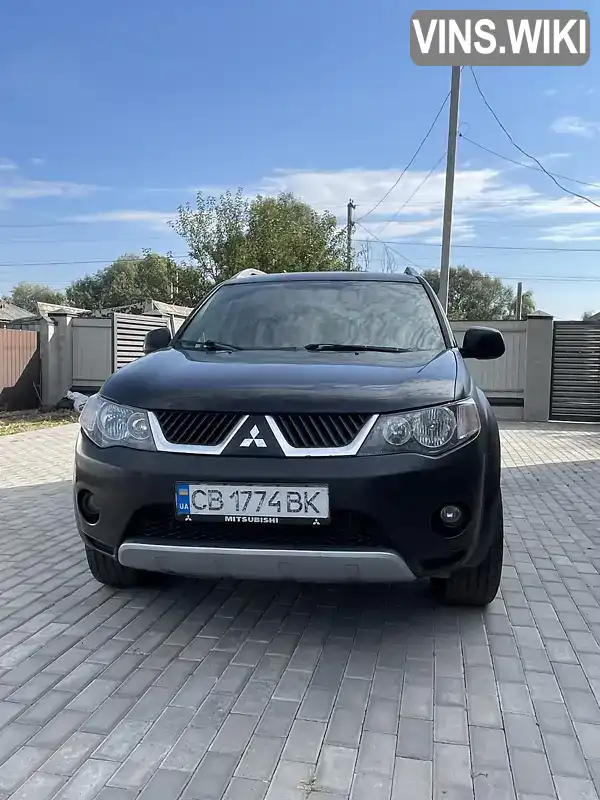 Позашляховик / Кросовер Mitsubishi Outlander 2007 2.4 л. Ручна / Механіка обл. Київська, Київ - Фото 1/21