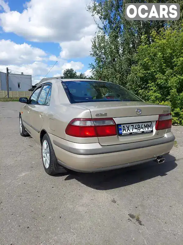 Седан Mazda 626 1998 null_content л. Автомат обл. Харківська, Харків - Фото 1/18