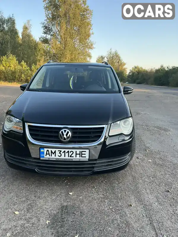 Мінівен Volkswagen Touran 2009 1.39 л. Ручна / Механіка обл. Житомирська, Коростень - Фото 1/21