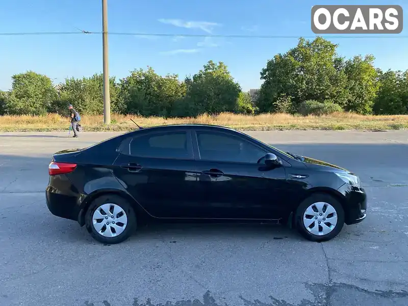 Седан Kia Rio 2013 1.4 л. Ручна / Механіка обл. Запорізька, Запоріжжя - Фото 1/12