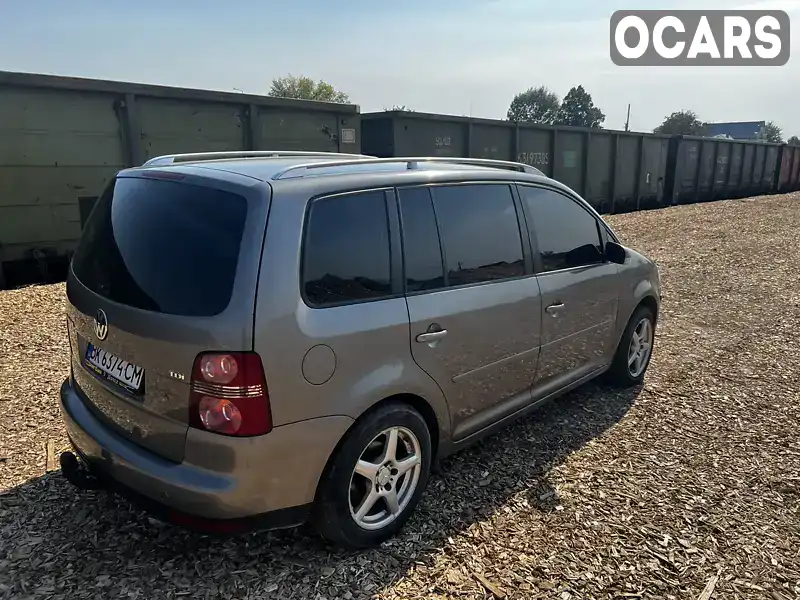 Мінівен Volkswagen Touran 2007 1.9 л. Ручна / Механіка обл. Рівненська, Костопіль - Фото 1/21