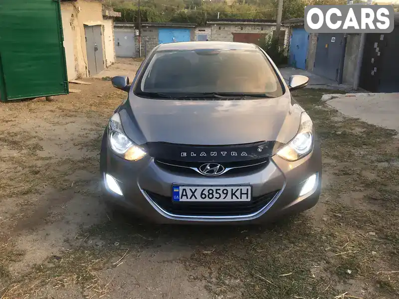 KMHDH41CACU289733 Hyundai Elantra 2011 Седан 1.59 л. Фото 1