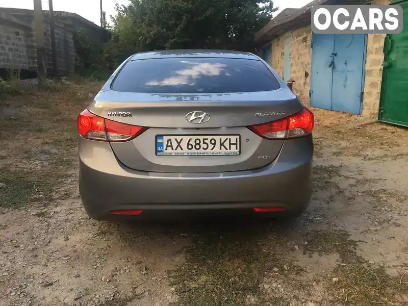 KMHDH41CACU289733 Hyundai Elantra 2011 Седан 1.59 л. Фото 2