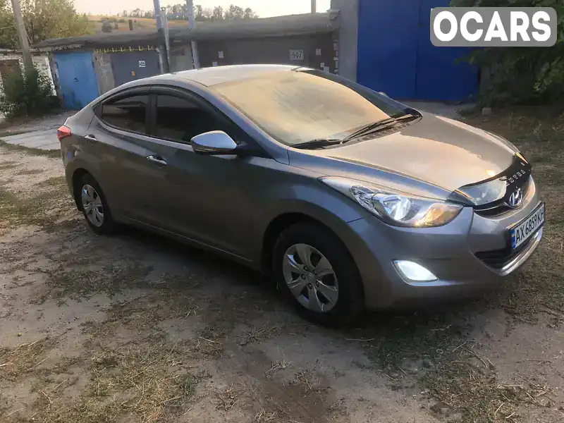 KMHDH41CACU289733 Hyundai Elantra 2011 Седан 1.59 л. Фото 4