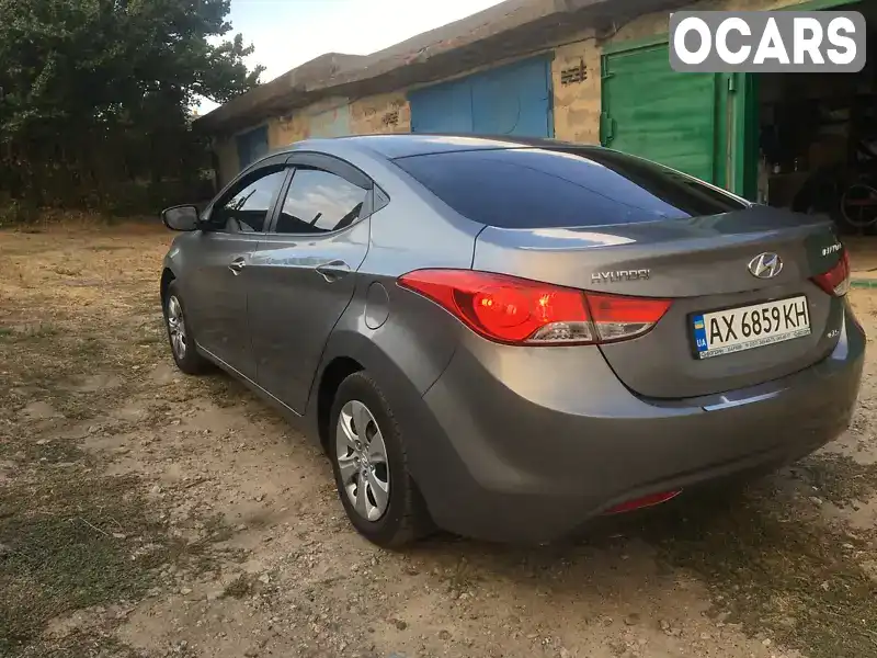 KMHDH41CACU289733 Hyundai Elantra 2011 Седан 1.59 л. Фото 5