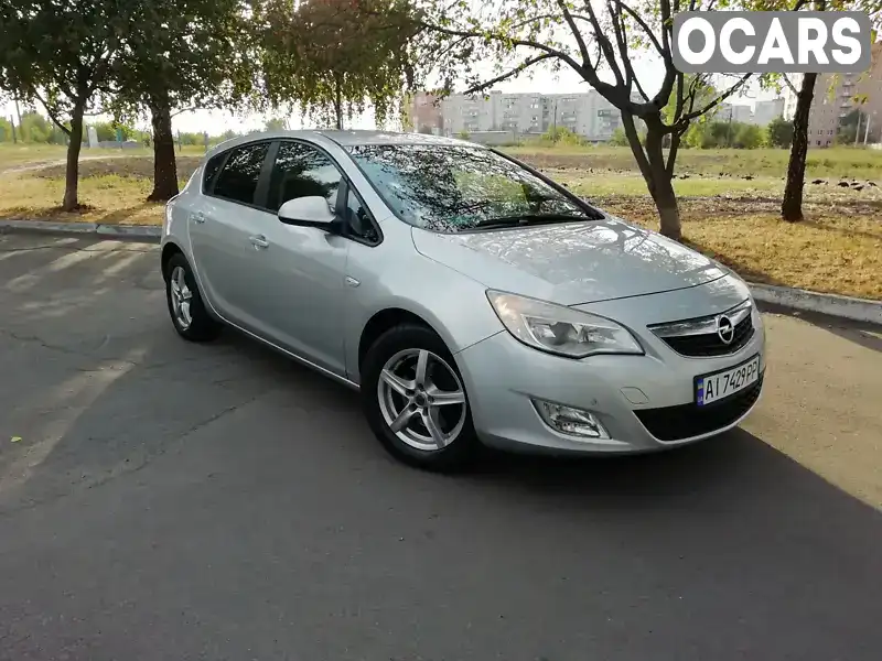 W0LPD6EG8AG051801 Opel Astra 2010 Хетчбек 1.69 л. Фото 2