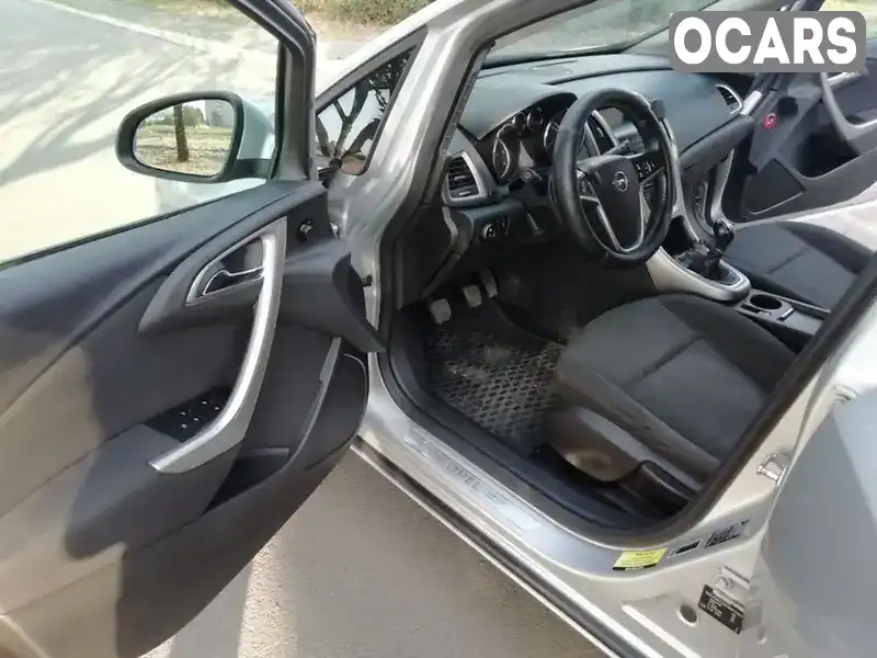 W0LPD6EG8AG051801 Opel Astra 2010 Хетчбек 1.69 л. Фото 6