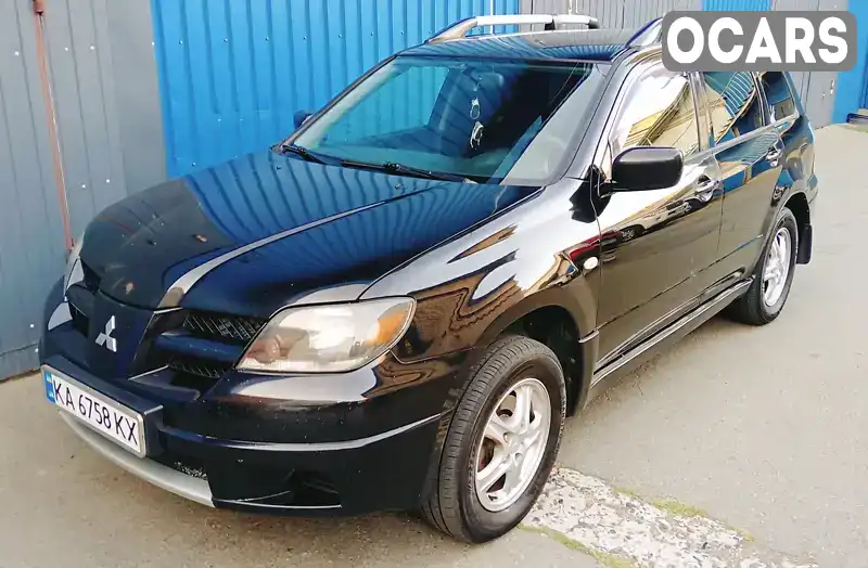 Позашляховик / Кросовер Mitsubishi Outlander 2004 2.38 л. Типтронік обл. Київська, Київ - Фото 1/7