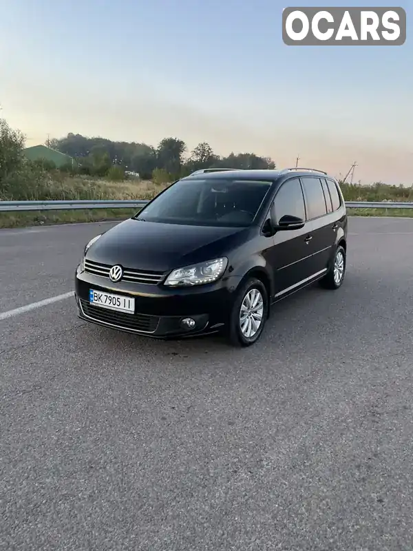 Мінівен Volkswagen Touran 2013 1.97 л. Ручна / Механіка обл. Рівненська, Дубно - Фото 1/21