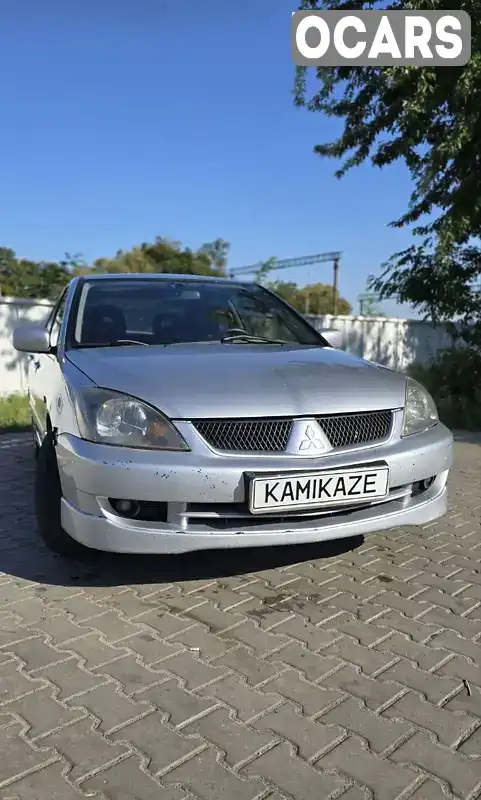 Седан Mitsubishi Lancer 2007 2 л. Ручна / Механіка обл. Київська, Ірпінь - Фото 1/9