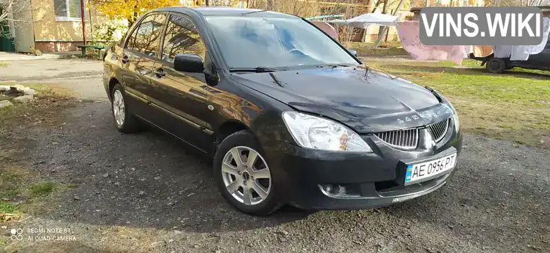 Седан Mitsubishi Lancer 2005 1.6 л. Ручна / Механіка обл. Дніпропетровська, Дніпро (Дніпропетровськ) - Фото 1/12