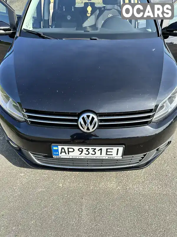 Минивэн Volkswagen Touran 2014 1.97 л. Ручная / Механика обл. Львовская, Самбор - Фото 1/21