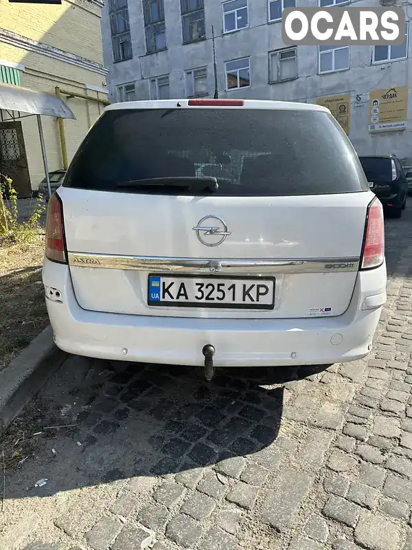 W0L0AHL35A2080926 Opel Astra 2010 Універсал 1.69 л. Фото 4