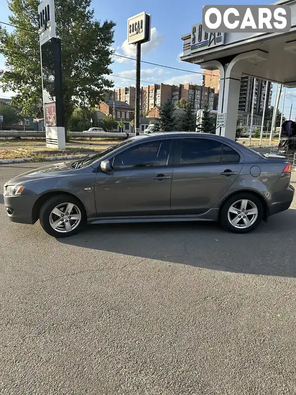 Седан Mitsubishi Lancer 2009 2 л. Варіатор обл. Харківська, Харків - Фото 1/21