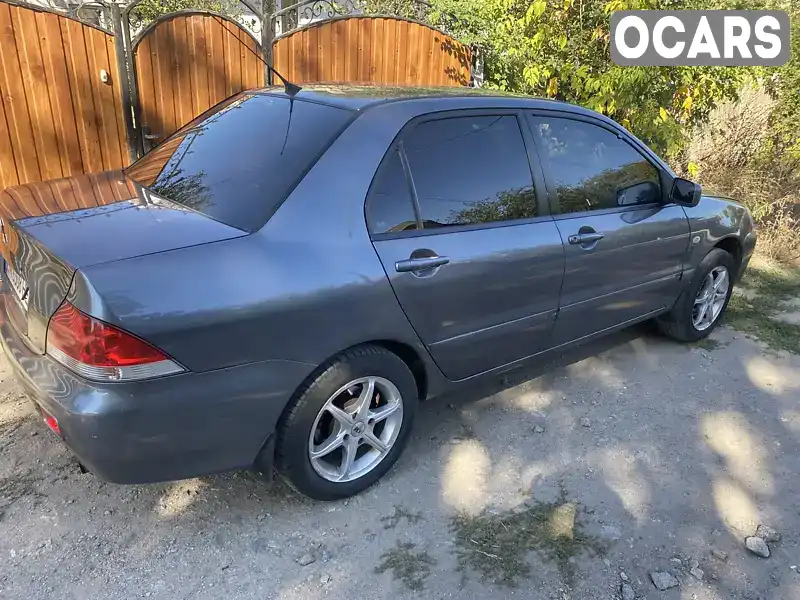 Седан Mitsubishi Lancer 2005 1.58 л. обл. Черкаська, Золотоноша - Фото 1/13