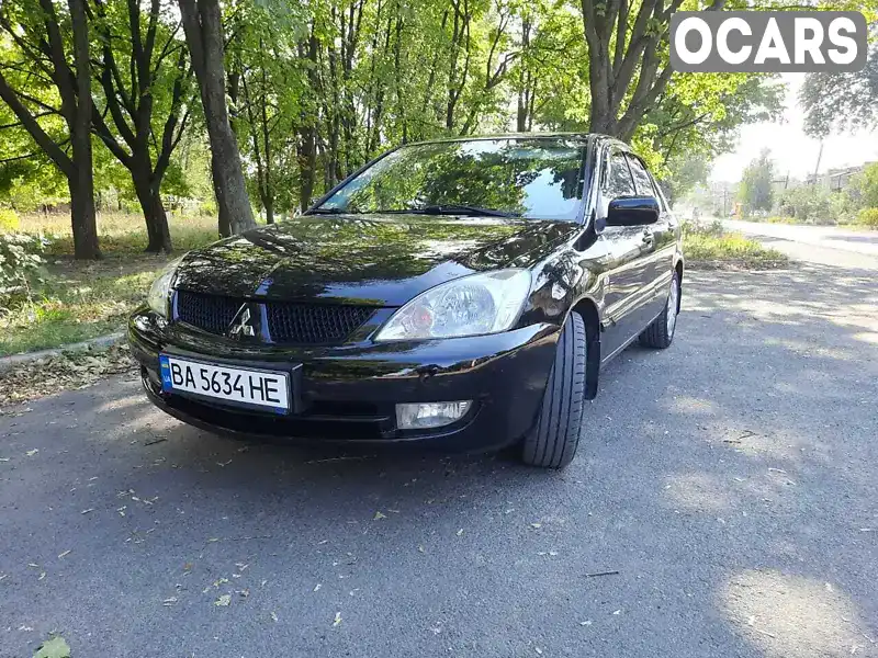 Седан Mitsubishi Lancer 2008 1.6 л. Ручна / Механіка обл. Кіровоградська, Гайворон - Фото 1/21