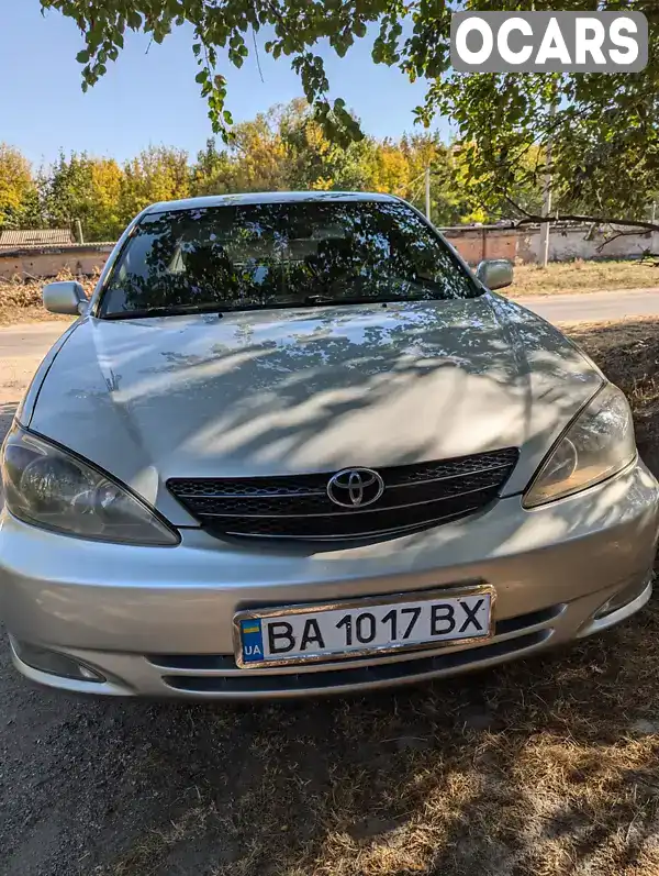 Седан Toyota Camry 2004 2.36 л. Автомат обл. Кировоградская, Знаменка - Фото 1/17