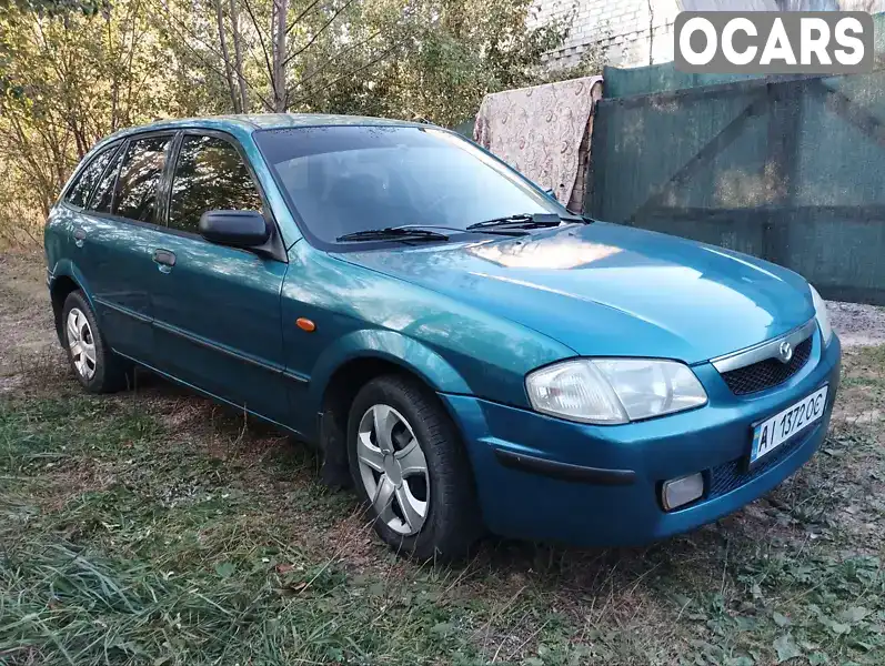 Хэтчбек Mazda 323 1999 1.5 л. Ручная / Механика обл. Житомирская, Житомир - Фото 1/17