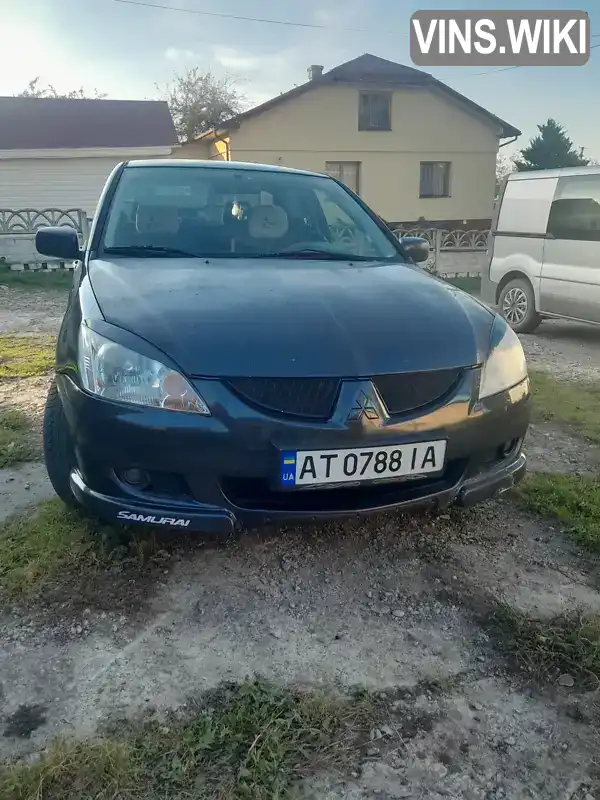 Седан Mitsubishi Lancer 2004 1.58 л. Ручна / Механіка обл. Івано-Франківська, Долина - Фото 1/14