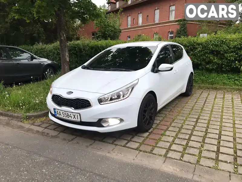 Хэтчбек Kia Ceed 2014 1.6 л. Автомат обл. Киевская, Киев - Фото 1/11