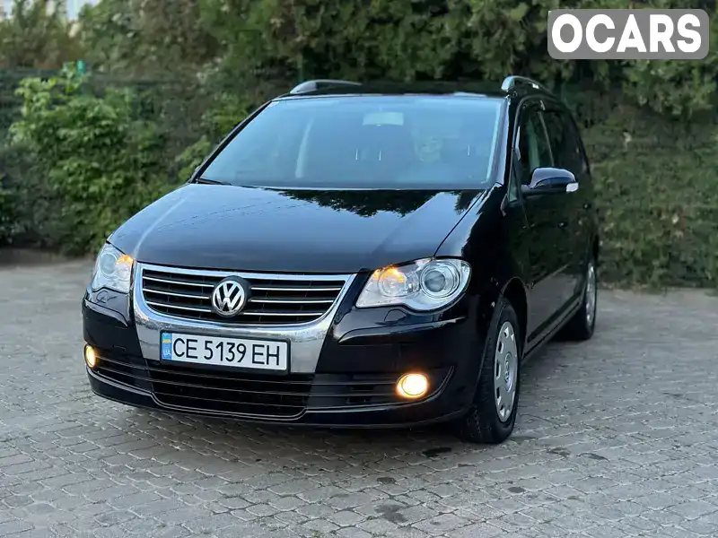 Мінівен Volkswagen Touran 2007 1.97 л. Ручна / Механіка обл. Чернівецька, Глибока - Фото 1/17