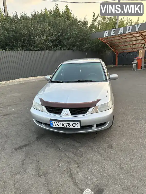 Седан Mitsubishi Lancer 2008 1.6 л. Ручна / Механіка обл. Харківська, Харків - Фото 1/21