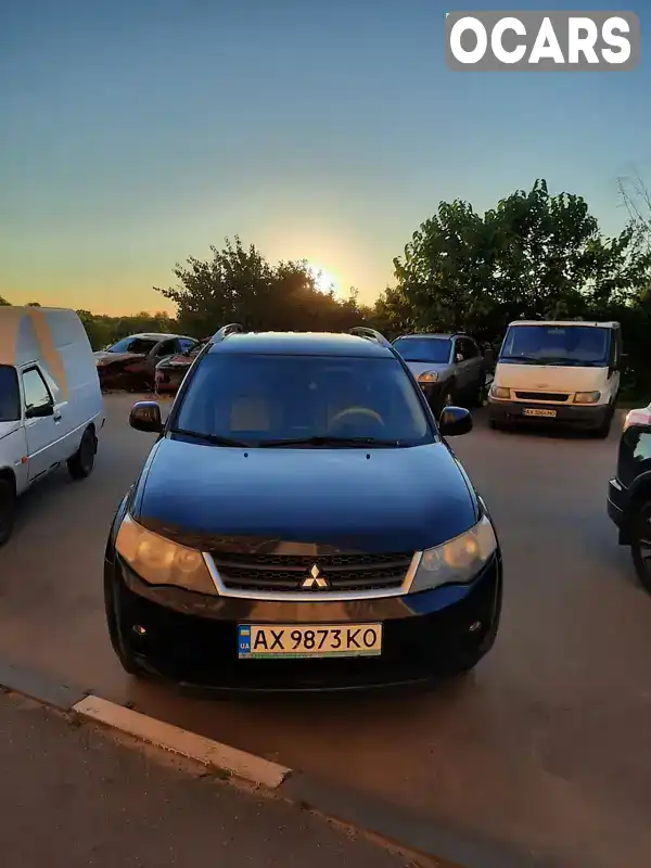 Позашляховик / Кросовер Mitsubishi Outlander XL 2008 2.36 л. Варіатор обл. Харківська, Харків - Фото 1/10