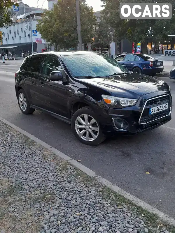 Позашляховик / Кросовер Mitsubishi Outlander Sport 2013 2 л. Автомат обл. Київська, Київ - Фото 1/15