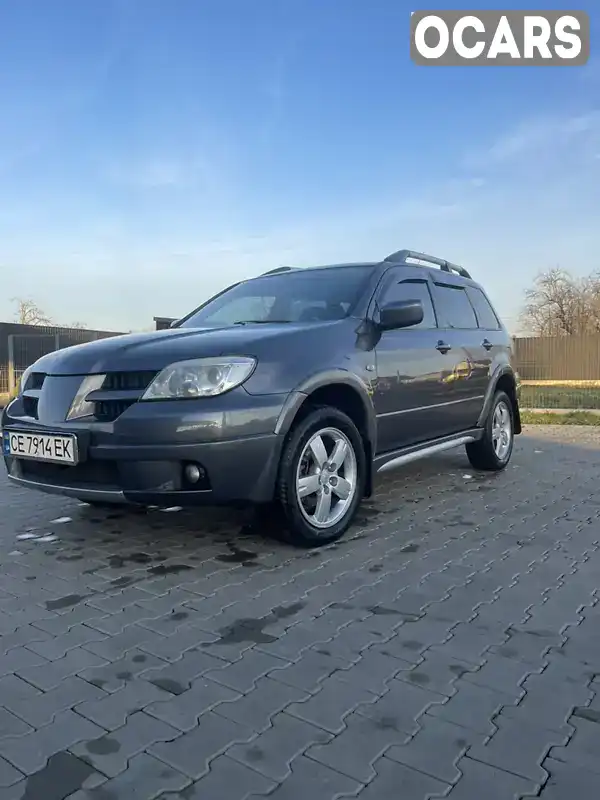 Внедорожник / Кроссовер Mitsubishi Outlander 2006 2.38 л. обл. Черновицкая, Хотин - Фото 1/15