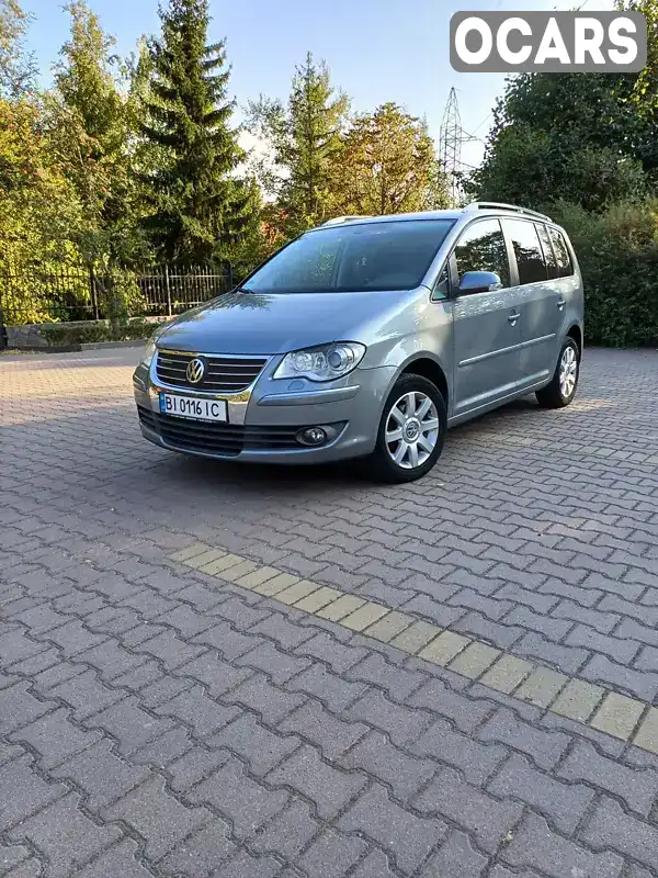 Мінівен Volkswagen Touran 2009 1.9 л. Ручна / Механіка обл. Полтавська, Миргород - Фото 1/13