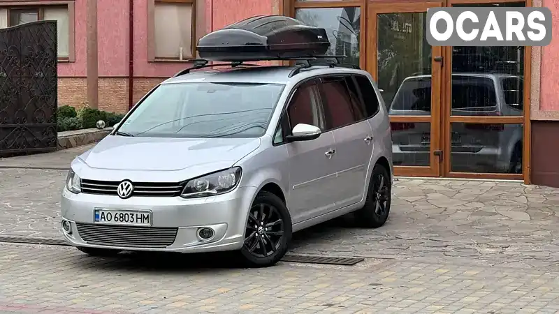 Мінівен Volkswagen Touran 2014 2 л. Автомат обл. Закарпатська, Ужгород - Фото 1/21