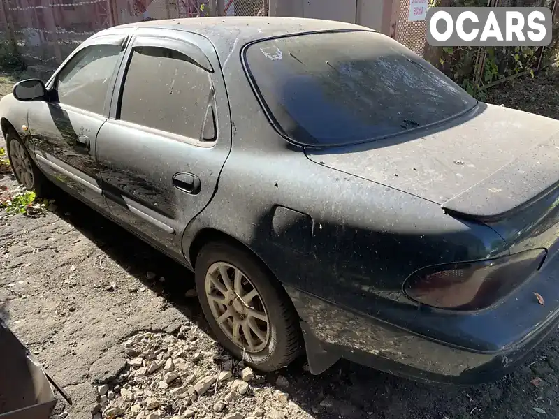 Седан Kia Clarus 1997 null_content л. Ручна / Механіка обл. Миколаївська, Миколаїв - Фото 1/14